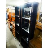 PAIR OF MODERN BLACK HIGH GLOSS FINISH OPEN BOOKCASES AND A THREE TIER SIDE TABLE WITH GLASS SHELVES