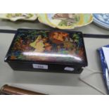 PROBABLY RUSSIAN, BLACK LACQUERED BOX WITH PICTORIAL COVER, 8" x 5" (20.3cm x 12.7cm)