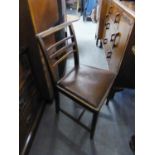 A SET OF FOUR LADDER BACK SINGLE CHAIRS