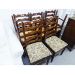 A SET OF EIGHT 1970's STAINED PITCH PINE LADDER BACK SINGLE DINING CHAIRS (8)