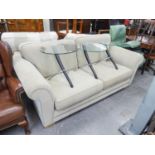 AN AS NEW MODERN THREE SEATER SETTEE IN FAWN CORD UPHOLSTERY