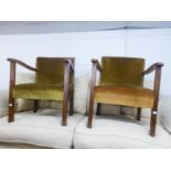A PAIR OF OAK LADDER BACK DINING CHAIRS AND A PAIR OF BEECHWOOD LOW SEATED EASY ARMCHAIRS, THE