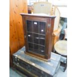 A MURAL OAK CORNER CUPBOARD WITH LEAD LIGHT DOOR