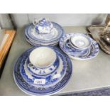 TWENTY TWO PIECES OF BLUE AND WHITE POTTERY TO INCLUDE; VARIOUS PLATES, CUPS ETC....