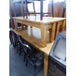 A LARGE PINE EXTENDING DINING TABLE, WITH TWO BENCH SEATS AND A SIMILAR DINING CHAIR (4)