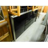 LARGE BLACK HIGH GLOSS SIDEBOARD WTIH CHROME BORDER, HAVING TWO CUPBOARD DOORS AND THREE CENTRAL