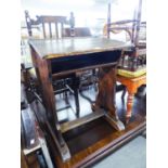 A HARDWOOD CHILD'S SCHOOL DESK