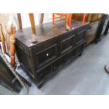 EIGHTEENTH CENTURY AND LATER OAK DOWER CHEST, with lift-up top and long drawer below, (lid replaced)