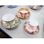 THREE CHINA SPECIMEN CUPS AND SAUCERS VIZ, A ROYAL CROWN DERBY CHINA DEMI TASSE CUP AND SAUCER,