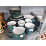 A DENBY DARK GREEN GLAZED POTTERY BREAKFAST AND DINNER SERVICE, PRINCIPALLY FOR FOUR PERSONS, 23