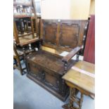 SMALL CARVED OAK MONKS BENCH