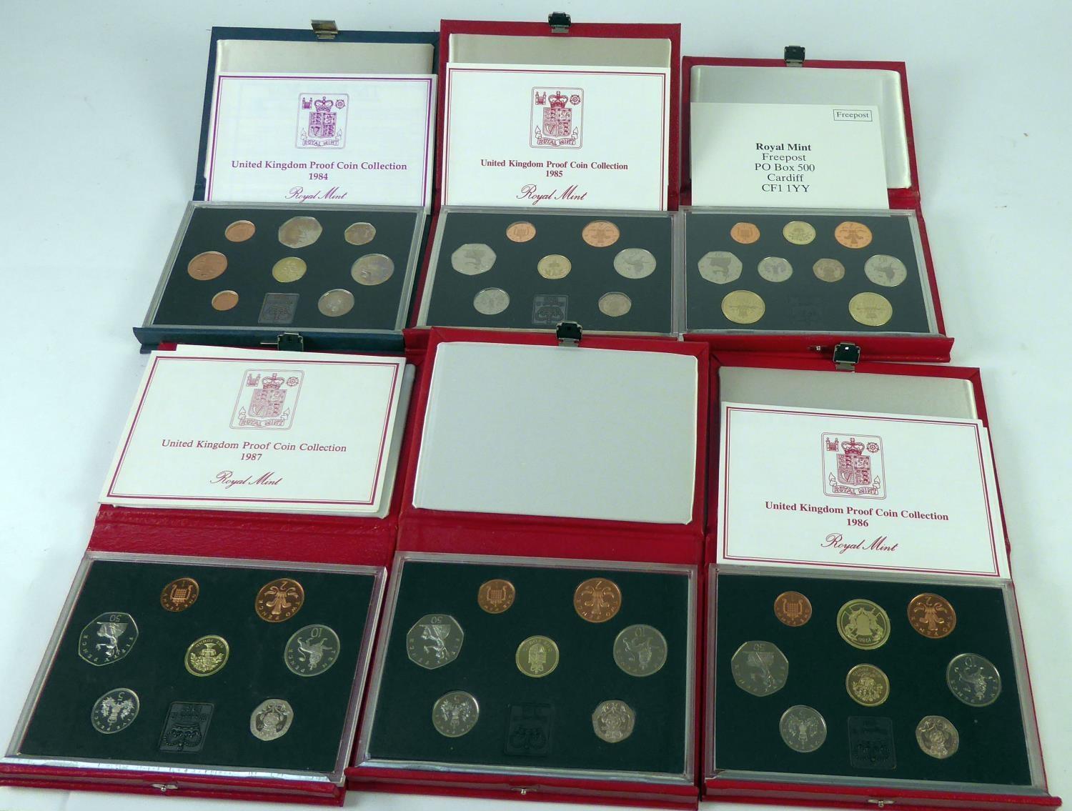 ROYAL MINT ISSUED COMMEMORATIVE COIN SETS 1984-1989, in original boxes unused (6)