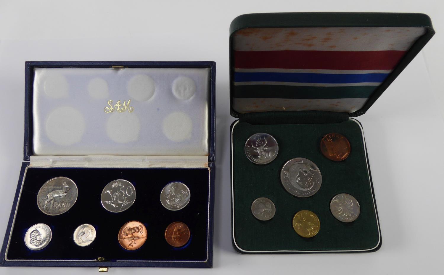 SOUTH AFTICA PROOF SET OF SEVEN COINS, 1965 includes one rand to one cent, a similar SET OF SIX