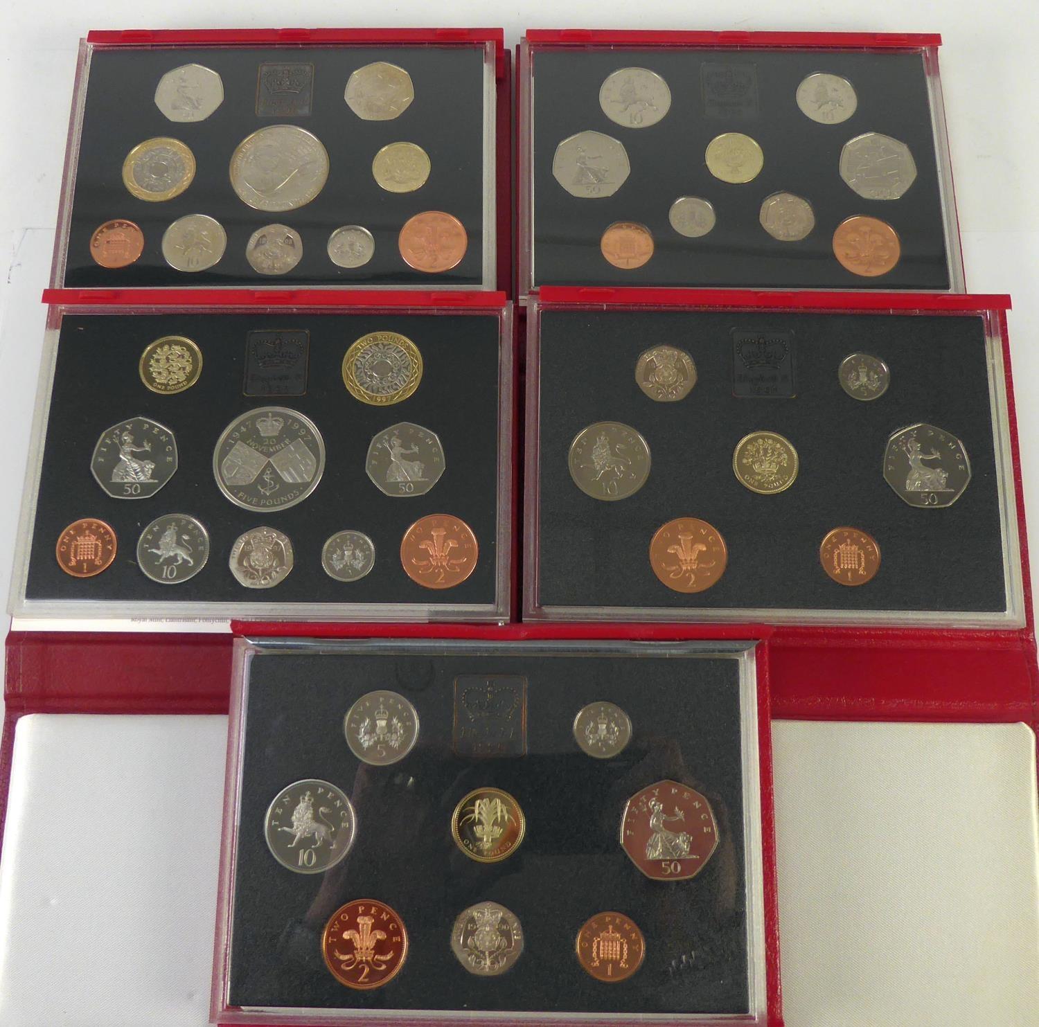 ROYAL MINT ISSUED COMMEMORATIVE COIN SETS 1990-1999, in original boxes unused (6)