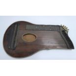 LINE INLAID ROSEWOOD ZITHER, with ivory feet and pegs, 26 ½” x 14” (67.3cm x 35.6cm), a/f