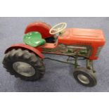 CHILD'S TRIANG VINTAGE PUSH-PEDAL DRIVEN TRACTOR with red metal bodywork, solid rubber heavy duty