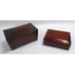 NINETEENTH CENTURY ROSEWOOD TEA CADDY, of sarcophagus form with bun feet, the interior with a pair