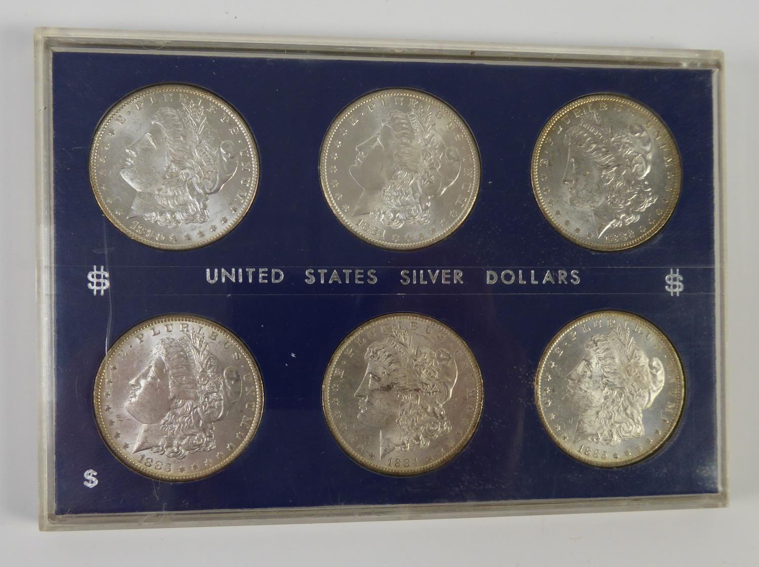 SIX UNITED STATES OF AMERICA 19th CENTURY SILVER DOLLAR COINS, 1880, 81, 82, 83, 84 and 85, each