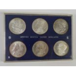 SIX UNITED STATES OF AMERICA 19th CENTURY SILVER DOLLAR COINS, 1880, 81, 82, 83, 84 and 85, each