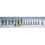 THIRTY PIECE CHINESE RED STAINED AND NATURAL CARVED IVORY PART CHESS SET, (one white bishop and