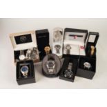 ELEVEN VARIOUS BOXED GENTLEMANS MODERN WRIST WATCHES, mostly quartz movement, makers to include;