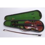 TWENTIETH CENTURY VIOLIN, with two part back, and a BOW, stamped: CZECHOSLOVAKIA, hard case