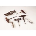 COLLECTION OF SEVEN VINTAGE/ ANTIQUE CORKSCREWS, including: TWO CAST STEEL EXAMPLES WITH WOODEN