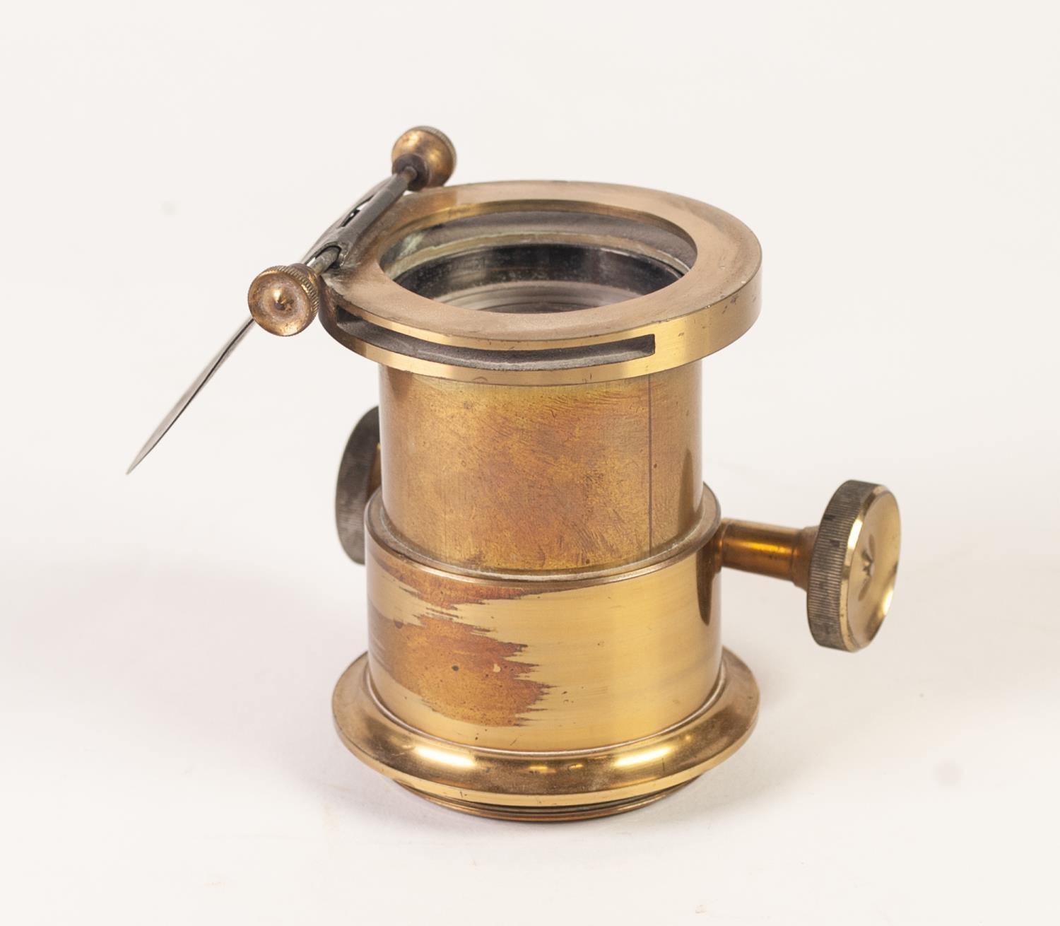 NINETEENTH CENTURY LACQUERED BRASS MAGIC LANTERN LENS, having 2"(5cm) diameter, main lens with - Image 2 of 2