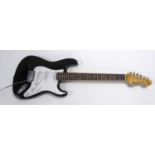 MODERN ENCORE BLASTER SIX STRING ELECTRIC GUITAR, in black with white pickguard, three pick-ups,