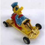 MARX TOYS CIRCA 1960's MOULDED PLASTIC DONALD DUCK GO-CART, friction powered, the base with
