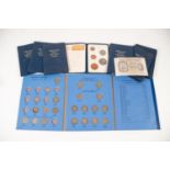 SEVEN PLASTIC COIN WALLETS 'BRITISH FIRST DECIMAL COINS' 1971, a BLUE COIN FOLDER OF SIX PENCE