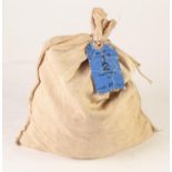 CREAM CLOTH BANK BAG CONTAIING FIVE POUNDS WORTH OF UNCIRCULATED 1967 HALF PENNY COINS, tied with