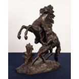 MARLEY HORSE, CAST SPELTER GROUP, dark patination with gilt dusted highlights, 16” (40.7cm) high