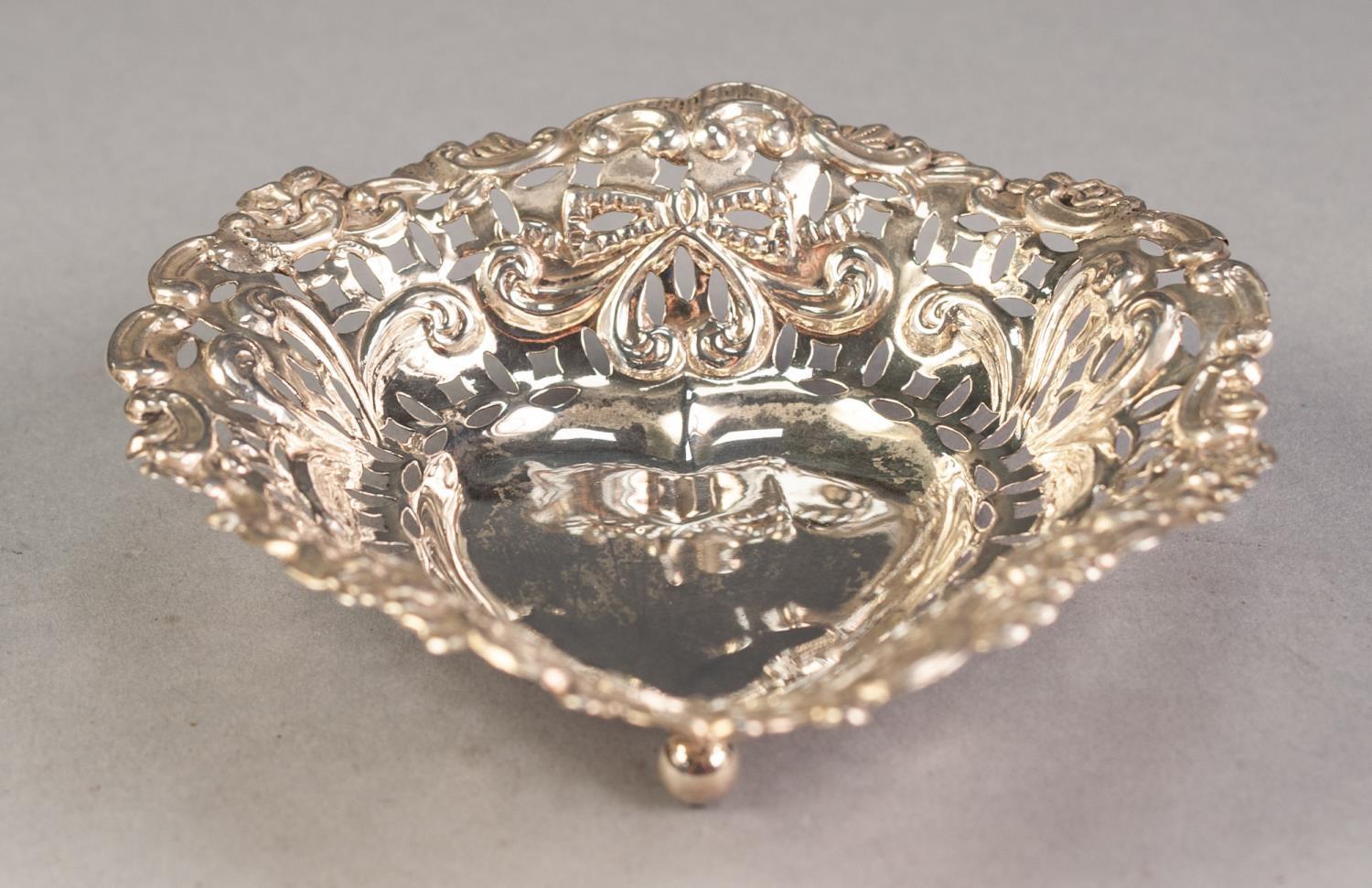 LATE VICTORIAN PIERCED SILVER HEART SHAPED BON BON DISH, on ball feet, 4â€ x 4 Â¼â€, Chester 1900, - Image 2 of 3