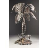 LATE VICTORIAN ELECTROPLATED TABLE CENTRE in the form of entwined palm trees with stag and two