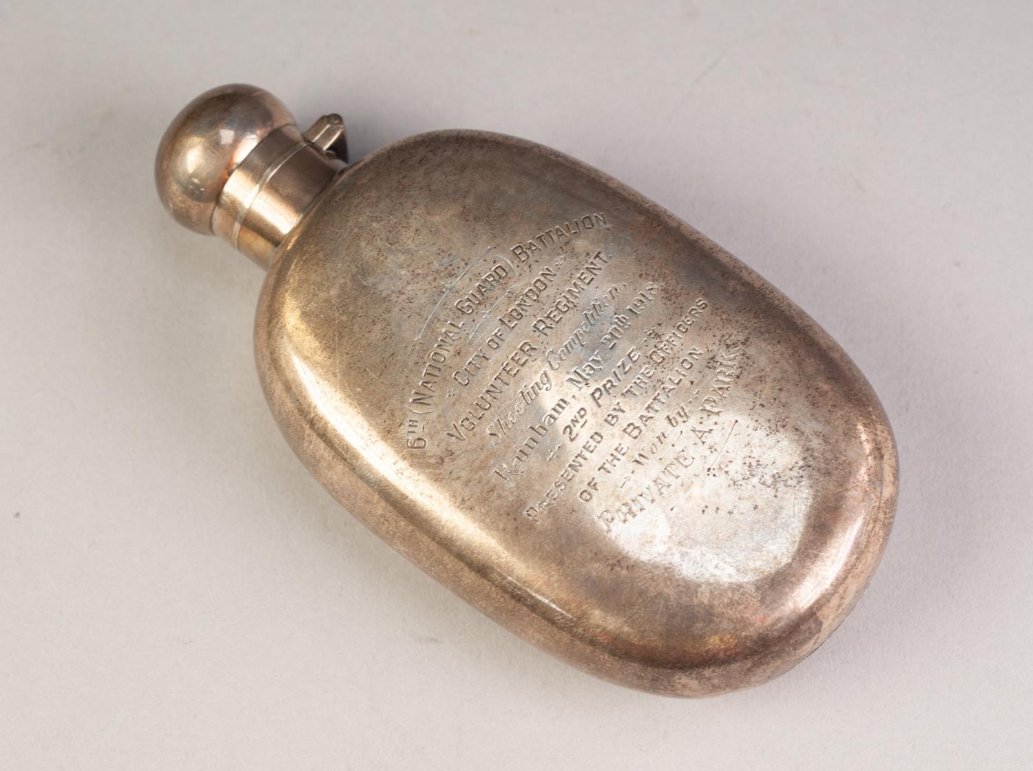 EDWARD VII PRESENTATION SILVER HIP FLASK, of oval form with bayonet hinged cover, 5 Â½â€ x 3â€ (