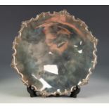 GEORGE V SILVER PEDESTAL DISH BY ADIE BROTHERS, of shallow form with shell capped slender embossed