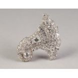 WHITE METAL AND DIAMOND BROOCH OF CORNUCOPIA SHAPE, with 91 old cut and baguette cut diamonds,
