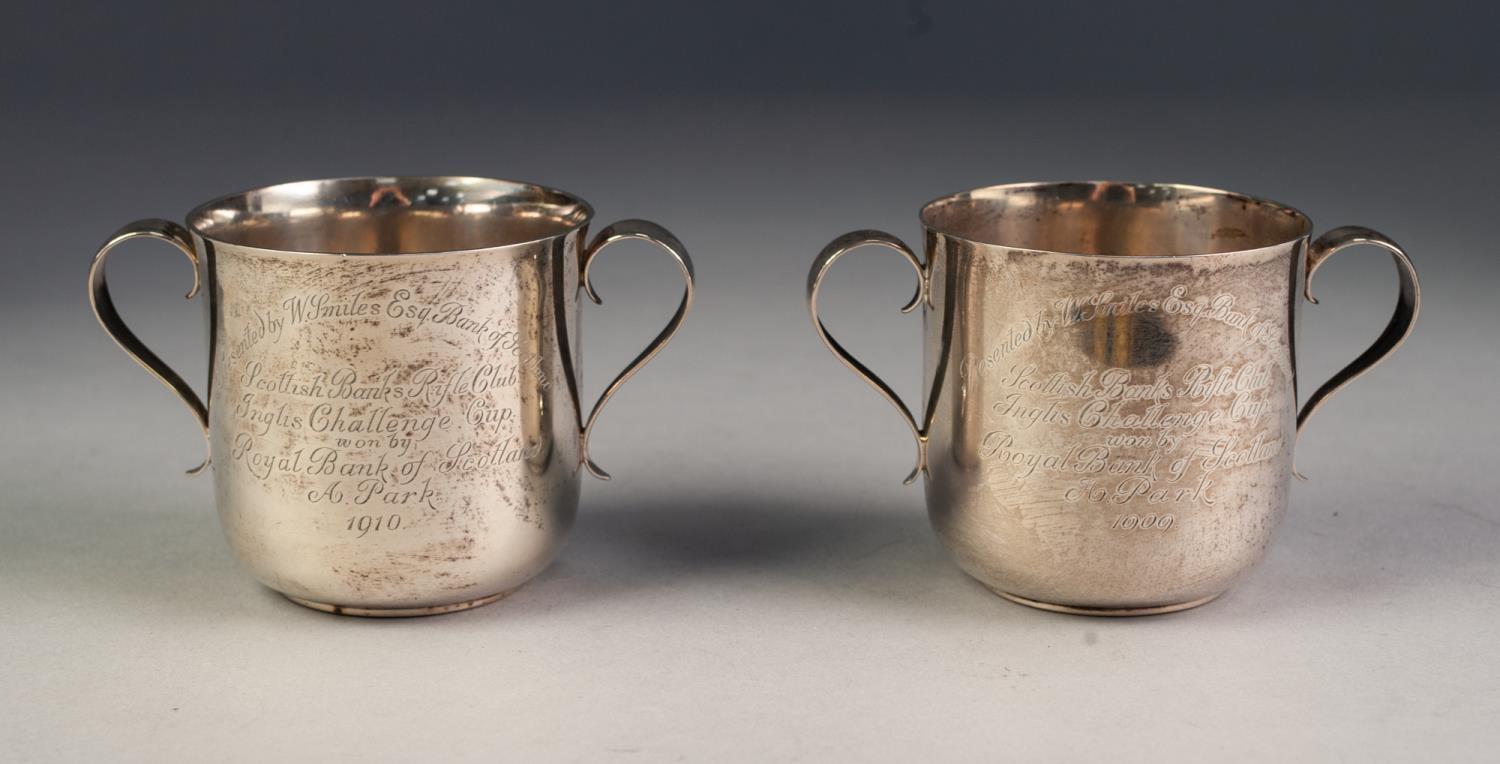 EDWARD VII, PAIR OF PRESENTATION SILVER TWO HANDLED CUPS, retailed by Garrard & Co Ltd, each of