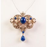 20th CENTURY 9ct GOLD BAROQUE BROOCH/PENDANT set with centre cabochon oval lapis lazuli, two similar