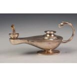 FOREIGN SILVER COLOURED METAL ROMAN OR GENIE LAMP PATTERN TABLE CIGARETTE LIGHTER, lacking wick