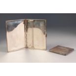 GEORGE VI ENGINE TURNED SILVER POCKET CIGARETTE CASE AND MATCHING LADIES COMPACT, the cigarette