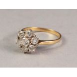 LATE VICTORIAN 18ct GOLD AND DIAMOND DAISY CLUSTER RING set with centre, slightly raised, old cut