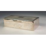 GEORGE VI PRESENTATION SILVER CLAD TABLE CIGARETTE BOX, with engine turned cover, initialled and