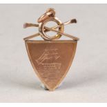 9ct GOLD PRIZE MEDALLION, SHIELD SHAPED WITH LIFEBUOY AND CROSSED OARS SURMOUNTING, the front