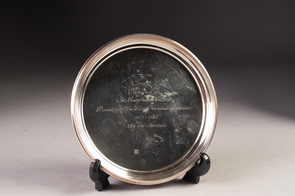 MODERN PRESENTATION SILVER WAITER BY BARKER ELLIS SILVER Co, of circular form with beaded border,