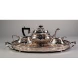 A GOOD SHEFFIELD â€˜ASHBERRYâ€™ SILVER PLATE THREE PIECE TEA SERVICE having gadrooned body and