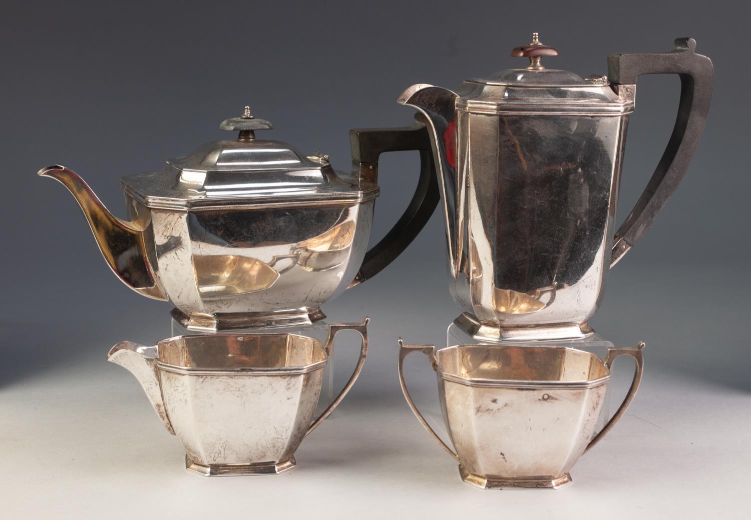 20th CENTURY SILVER FOUR PIECE TEA AND COFFEE SERVICE of canted oblong form, the tea and coffee pots