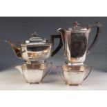 20th CENTURY SILVER FOUR PIECE TEA AND COFFEE SERVICE of canted oblong form, the tea and coffee pots