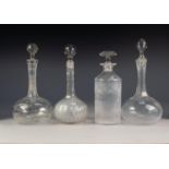 COLLECTION OF NINE NINETEENTH CENTURY AND LATER GLASS DECANTERS AND STOPPERS, including four globe